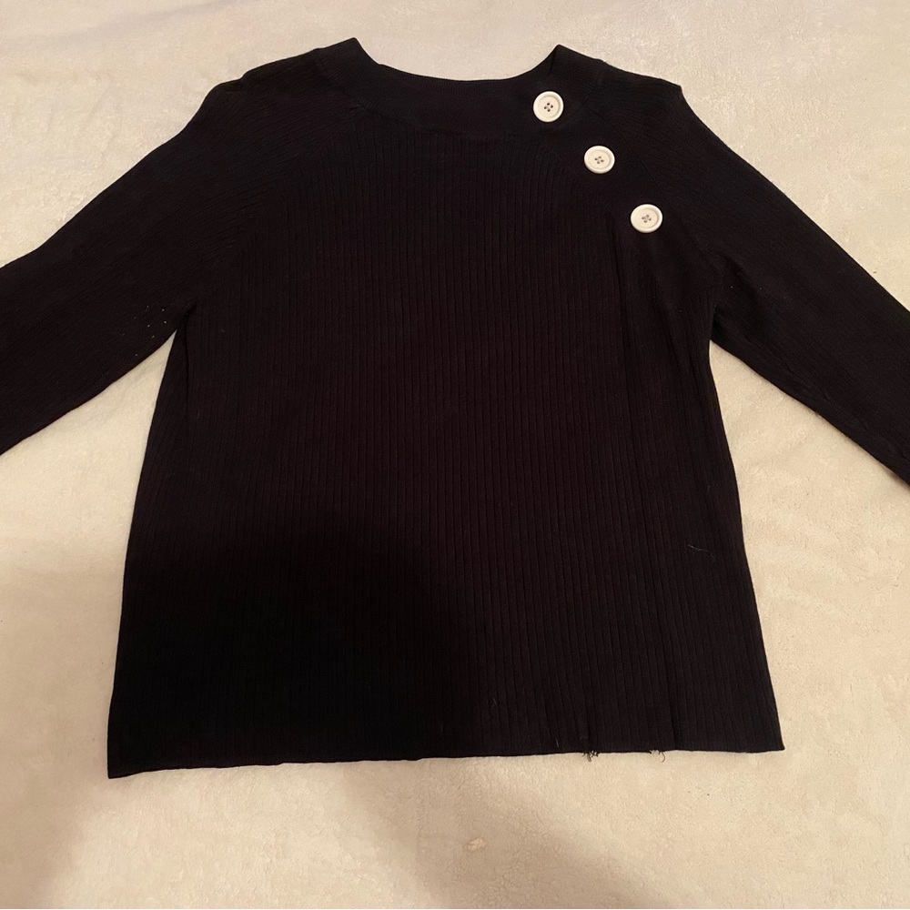 Long sleeve black winter shirt.